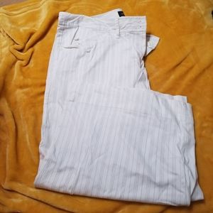 A white pair of crops with brown pin stripe